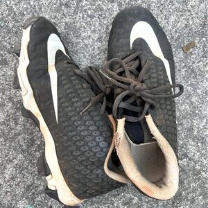 Nike cleats. Big kid size 5. Loved but good condition.
